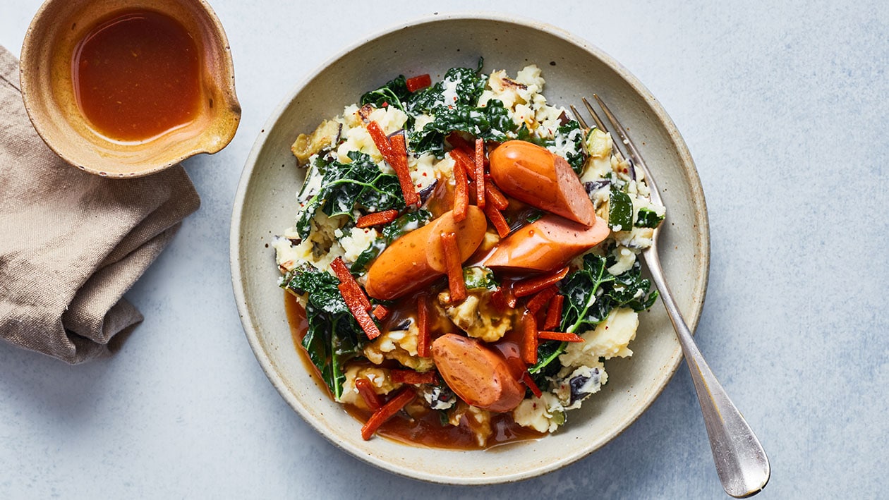 Italiaanse stamppot met vegetarische roockworst, speckjes en jus Italiaanse stamppot met vegetarische roockworst, speckjes en jus